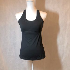 LULULEMON BLACK ATHLETIC TOP WITH BUILT IN BRA. SIZE 6. PRETTY Cross/strap back.